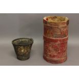 A RED PAINTED CANVAS STAND 59 cms high and a Fire Bucket, each with remnants of the Royal Arms (2)