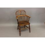 A YEW, BEECH AND ELM WINDSOR ARM CHAIR. A 19th century Windsor arcmchair with arched back, yew