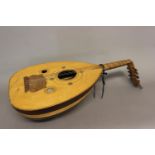 A RENAISSANCE STYLE LUTE. A full bodied Renaissance style lute with three sound holes, body with