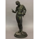 AN ITALIAN CAST AND PATINATED BRONZE FIGURE OF NARCISSUS. After the antique, standing, naked