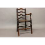 AN EARLY 18TH CENTURY LADDER BACK CHILD'S CHAIR. With tapering uprights with four graduated arch