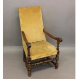 A WALNUT FRAMED WILLIAM AND MARY STYLE OPEN ARMCHAIR. With a rectangular raised back, scrolling arms