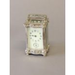 A 19th CENTURY SILVER PLATED CARRIAGE CLOCK. With a rectangular ivory effect dial with Arabic