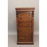 A VICTORIAN MAHOGANY WELLINGTON CHEST. With a rectangular top above eight graduated short drawers