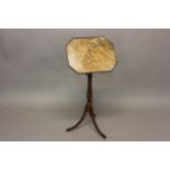 A LATE GEORGE III MAHOGANY READING OR MUSIC STAND. With a rectangular top with canted corners and