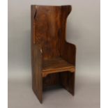 A 19TH CENTURY BOARDED ELM CHILD'S CHAIR. A child's chair of unusual boarded form with a tall