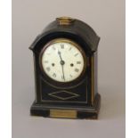 A LATE GEORGE III EBONY CASE BRACKET CLOCK. With a circular convex white enamelled dial with Roman