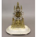 A VICTORIAN STYLE BRASS SKELETON CLOCK. With a fretted chapter ring with Roman numerals, with an