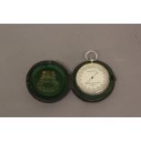 A POCKET BAROMETER BY NEGRETTI AND ZAMBRA. An aneroid pocket barometer with a 4.5cm silvered dial