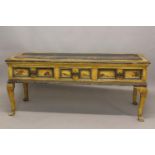 A LACQUER WORK CHINOISSERIE SIDE TABLE. The broad rectangular top worked with a scene of Chinese