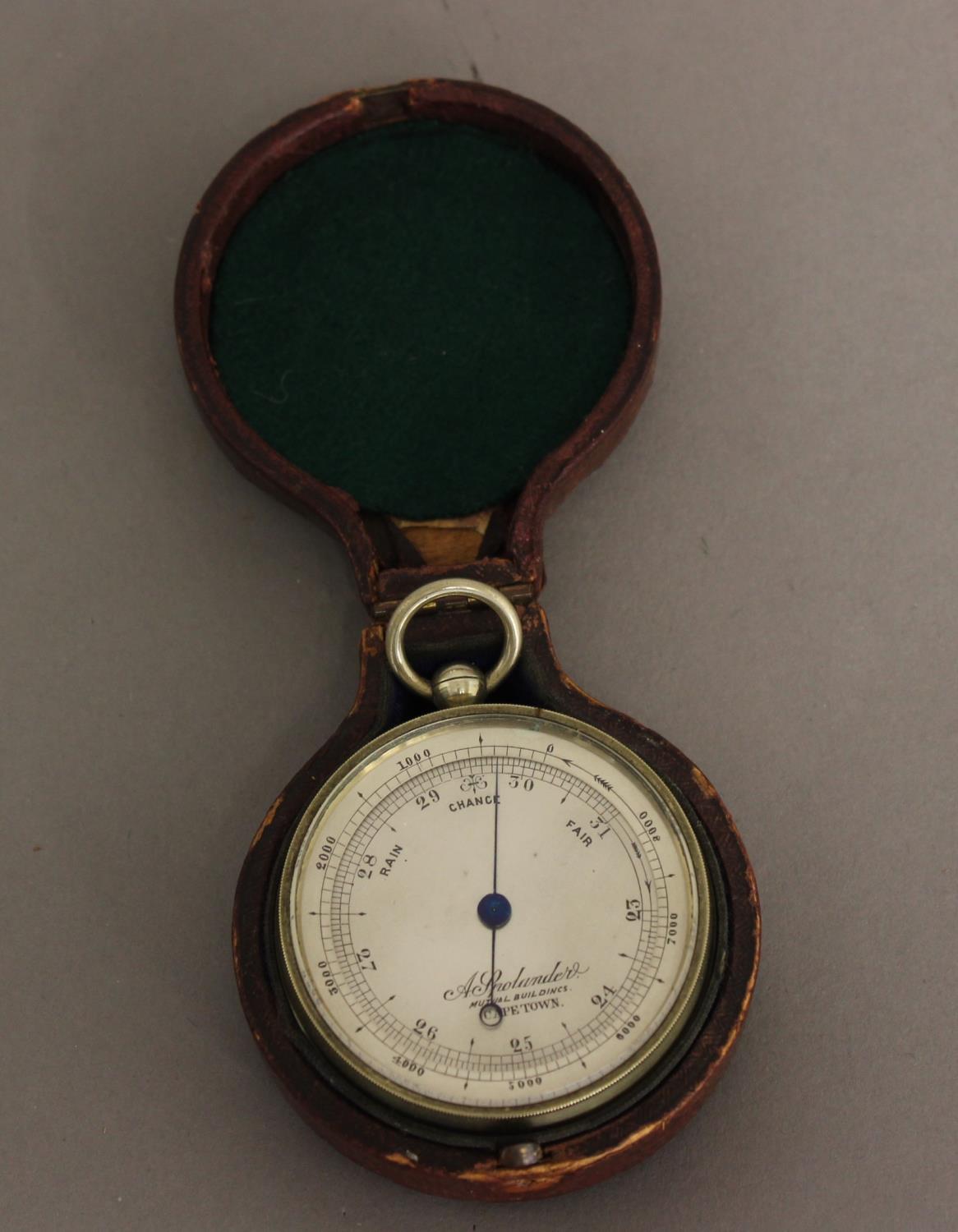 A POCKET BAROMETER BY A. SPOTLANDER OF CAPE TOWN. With a 4.5cm silvered dial marked A. Spotlander