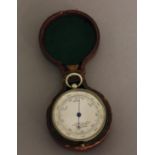 A POCKET BAROMETER BY A. SPOTLANDER OF CAPE TOWN. With a 4.5cm silvered dial marked A. Spotlander