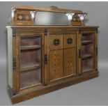 A VICTORIAN WALNUT AESTHETIC PERIOD SIDE CABINET BY H. OGDEN OF MANCHESTER. With a raised shelf