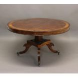 A REGENCY ROSEWOOD BRASS INLAID BREAKFAST TABLE. With a broad circular top with two lines of brass