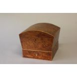 A REGENCY BURR WALNUT WORK BOX. With a domed top with decorative crossbanding enclosing a velvet