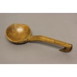 A WELSH SYCAMORE LADLE. Late 19th or early 20th century with a broad dished bowl on a shaped