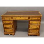A VICTORIAN PAINTED PINE AND ROSEWOOD EFFECT WRITING DESK. With a rectangular top with moulded edges