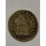 A LOUIS XIV SILVER FRENCH 5 SOLS COIN. A Louis XIV Silver French 5 Sols coin dated 1703.