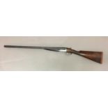 A 12 BORE SHOTGUN BY C.G. EDWARDS AND SON. A 12 Bore shotgun with 70.4cm side by side barrels marked