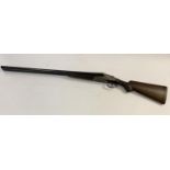 A 12 BORE SPANISH DOUBLE BARREL SHOTGUN. With 70cm sie by side barrels marked 'Made in Spain