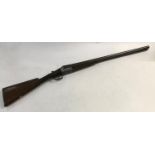 A 12 BORE SHOTGUN BY MANTON AND CO. A 12 Bore Shotgun with 71cm side by side sleeved barrels