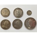 A SMALL COLLECTION OF VICTORIAN AND LATER SILVER COINS. Victorian halfcrowns for 1887, 1889, and