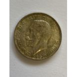 A GEORGE V FLORIN. A George V Florin, first coinage, bare head, l. dated 1919, with lustrous