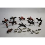 BRITAINS HUNTING SET a collection of painted metal hunt related figures, including various riders on