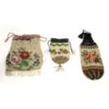 19THC BEADWORK DRAWSTRING PURSES three 19thc beadwork purses, each with a floral design. Largest