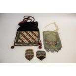 19THC BEADWORK DRAW STRING PURSE with cut steel fringing, also with a wool and felt bag with bead