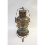 LARGE COPPER SHIPS LANTERN - THE MARITIME the copper lantern with a glass centre and metal handle,