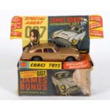 CORGI TOYS - JAMES BOND a Corgi Toys 261 James Bond's Aston Martin DB 5 with two figures inside,