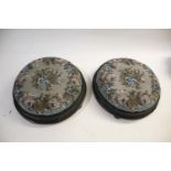 PAIR OF 19THC BEADWORK STOOLS a pair of beadwork and wooden foot stools, each with ceramic bun feet.