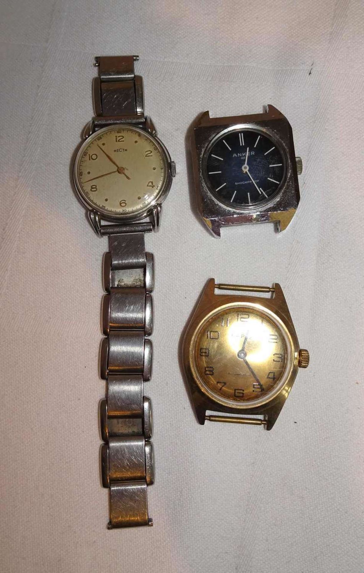 3 mechanische Herrenarmbanduhren, dabei 1 Recta, 1 Anker 100, sowie 1 Karex. Alle Uhren mit Funktio