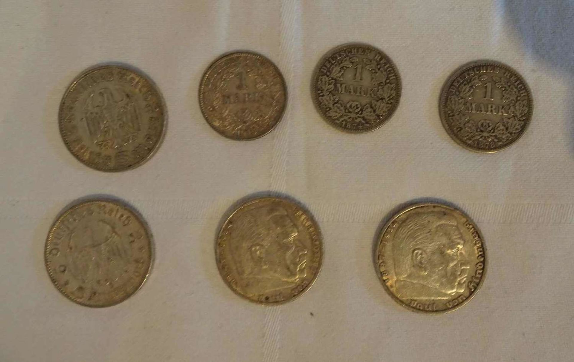 Lot Silbermünzen, bestehend aus 4x 5 Reichsmark (3x Hindenburg, 1x Garnisionskirche), sowie 3x 1