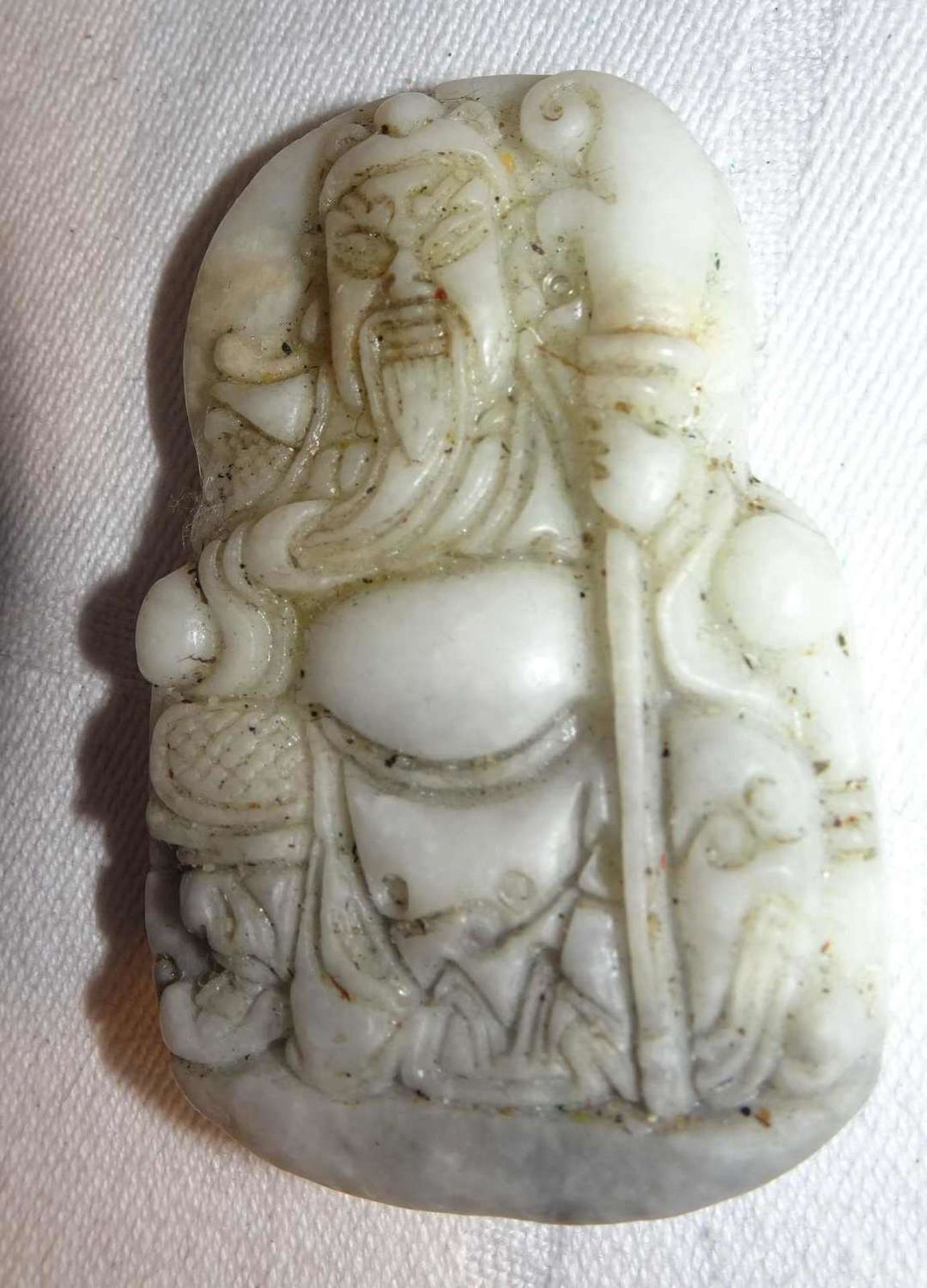 Jade Amulett "Buddha", weiße Jade. Aus Sammlung. Höhe ca. 5,3 m, Breite ca. 3,5 cmJade amulet "Bu