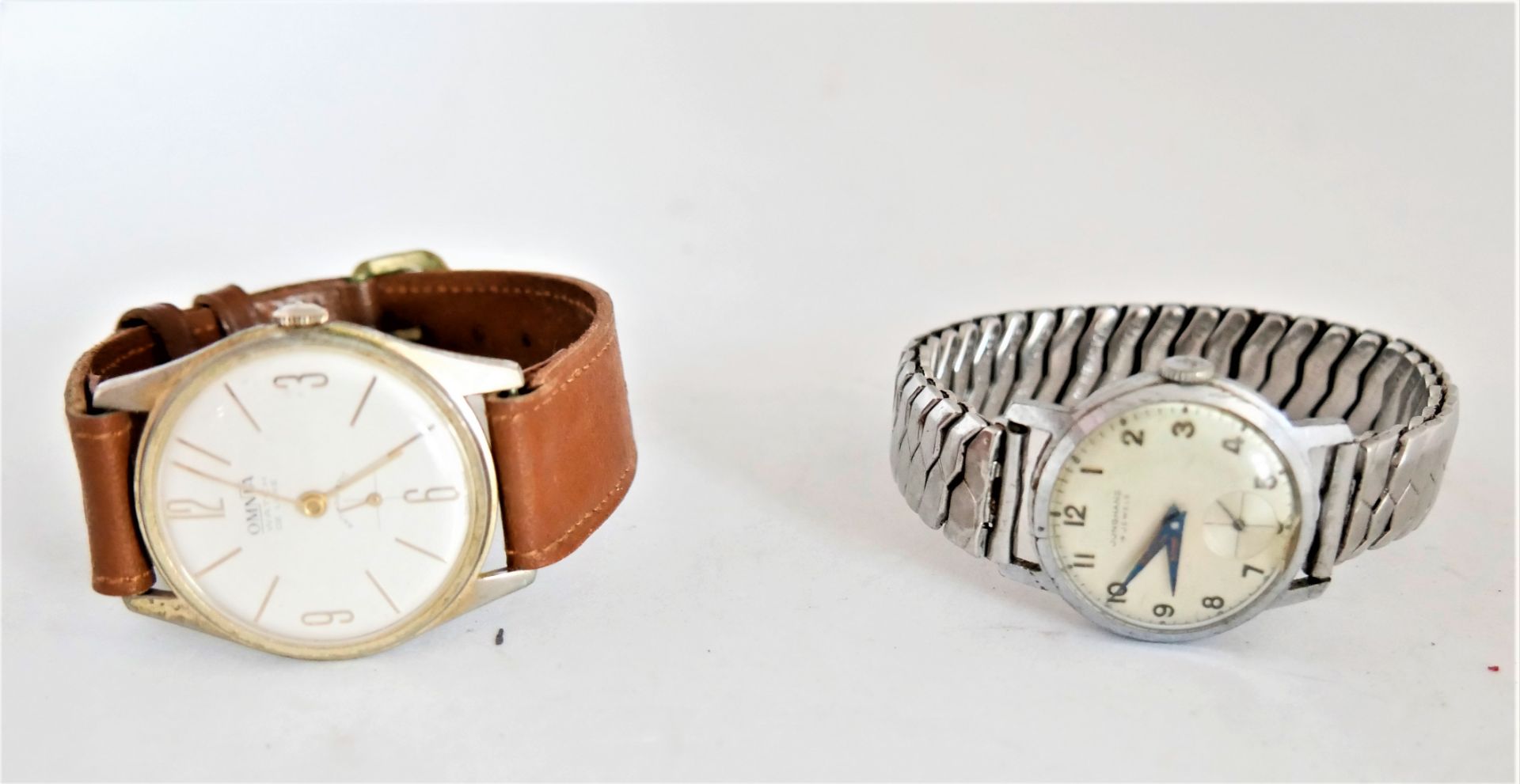 2 Herrenarmbanduhren, mechanisch. 1x Omnia Watch sowie 1x Junghans.