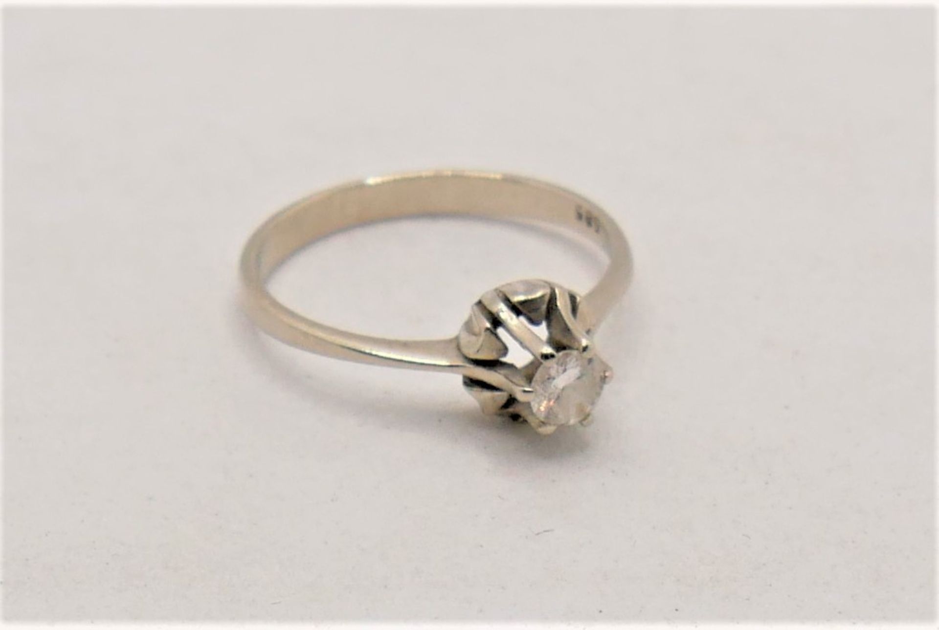 Damenring, 585er Weißgold, besetzt mit Diamant, Punze 0,21 ct, leichte Einschlüsse. Ringgröße 55,