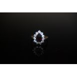 GARNET AND PASTE SET CLUSTER RING SET TO 9CT GOLD BAND