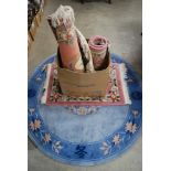 PAIR OF CHINESE PINK GROUND FIRESIDE RUGS, BLUE GROUND CIRCULAR CHINESE RUG AND TWO OTHER CHINESE