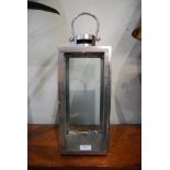 WHITE METAL AND CLEAR GLASS HURRICANE LAMP