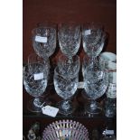 TWELVE ASSORTED CUT GLASS WINE GOBLETS