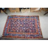 PERSIAN RUG, LATE 19TH/ EARLY 20TH CENTURY, THE BLUE GROUND DECORATED WITH ALLOVER DESIGN OF