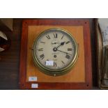 VINTAGE BRASS CASED SHIPS CLOCK T.L. AINSLEY LTD, SOUTH SHIELDS, MOUNTED ON SQUARE WOODEN PLINTH