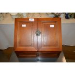 A 20TH CENTURY STAINED PINE TABLETOP STATIONERY CABINET