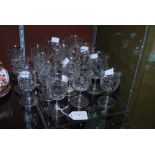 ASSORTED EARLY 20TH CENTURY WINE AND LIQUEUR GLASSES WITH FLORAL ETCHED BOWLS