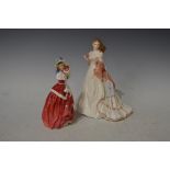 ROYAL DOULTON FIGURE "CHRISTMAS MORN" HN1992, AND A ROYAL WORCESTER HIGH SOCIETY FIGURE