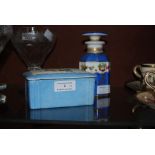 CONTINENTAL PORCELAIN BLUE GROUND OCTAGONAL SHAPED DRESSING TABLE BOTTLE AND STOPPER DECORATED