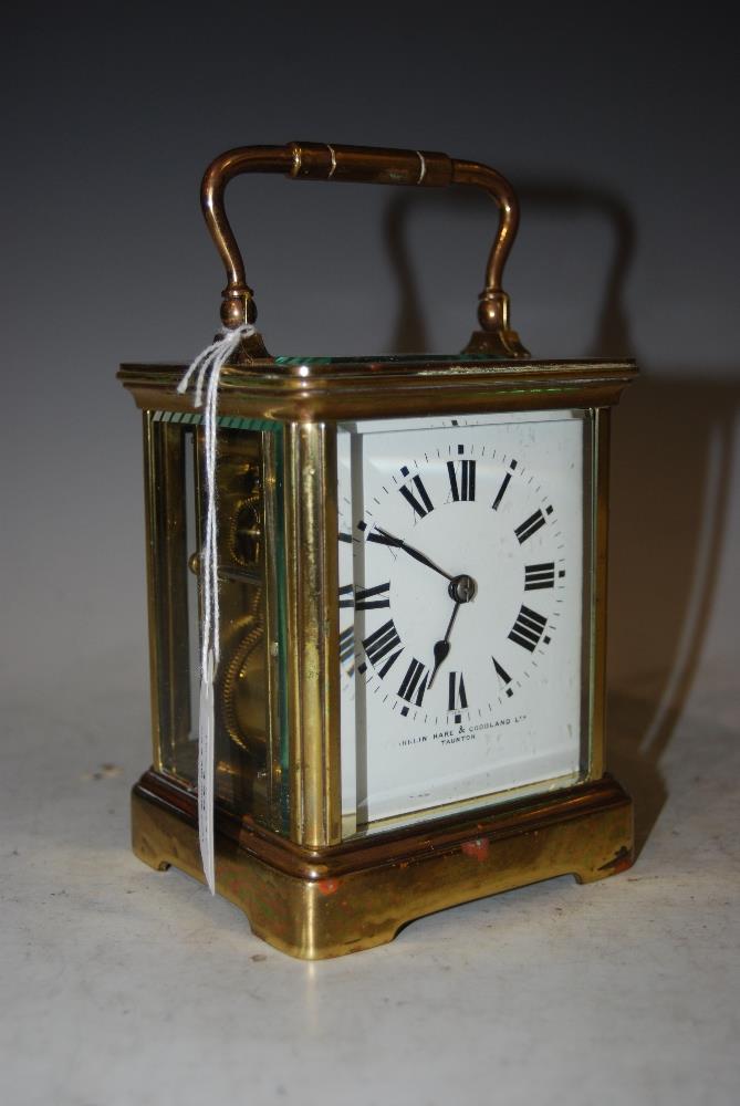 LACQUERED BRASS CARRIAGE CLOCK WITH ROMAN NUMERAL DIAL, FRANKLIN, HARE AND GOODLAND LTD. TAUNTON,