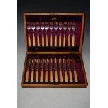 MAHOGANY CASED PART CANTEEN OF FISH KNIVES AND FORKS